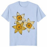 Anti Trump flower shirt close-up with daffodil trio protest design