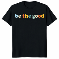 Be The Good Shirt with colorful retro lettering on a black graphic tee
