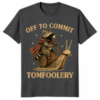 Funny raccoon meme shirt in dark heather grey with a caped raccoon riding a snail, off to commit tomfoolery