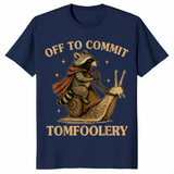 Funny raccoon meme shirt in navy with a caped raccoon riding a snail, off to commit tomfoolery