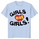Girls Eat Girls pride shirt in light blue with bold queer humor slogan graphic