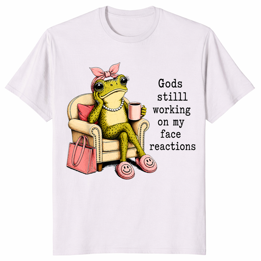 Ice Grey God's Still Working On My Face shirt with an unimpressed frog holding coffee