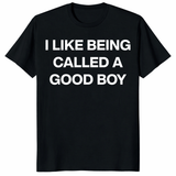 I Like Being Called A Good Boy T Shirt in black with bold white text front design