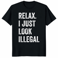 Relax I Just Look Illegal Shirt in Black - Bold Political Humor Graphic Tee