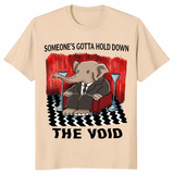 Someone’s Gotta Hold Down The Void shirt in sand with surreal elephant design