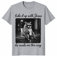 Take it up with Jesus shirt in sport grey, raccoon sipping iced coffee