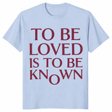 To Be Loved Is To Be Known Shirt in light blue with romantic minimalist text graphic