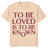 To Be Loved Is To Be Known Shirt in sand featuring stacked minimalist quote design