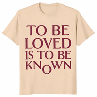 To Be Loved Is To Be Known Shirt in sand featuring stacked minimalist quote design