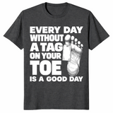 Toe tag shirt reading every day without a tag on your toe is a good day, dark heather grey